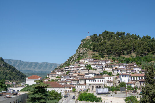 Traditional white Ottoman houses on a hillside on a summer day, Berat, Albania
