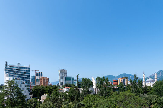 Cityscape with Modern skyscrapers and mosque on a summer day, Tirana, Albania