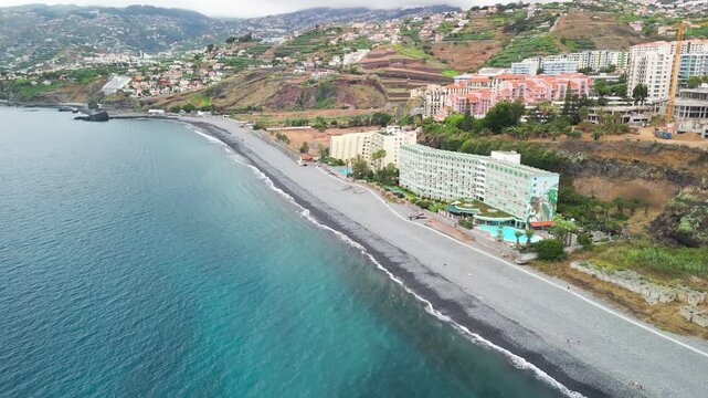 Dramatic aerial drone view of Doca do Cavacas natural volcanic pools and rugged Madeira cliffs
