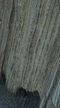 Close view of Flysch cliff and stone strata at Itzurun in Zumaia