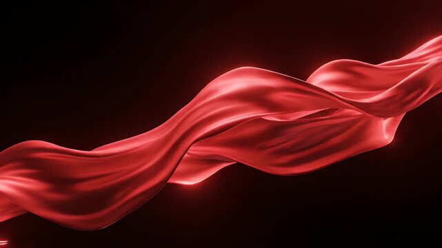 Elegant Red Silk Fabric Flowing Gracefully Against Dark Background.