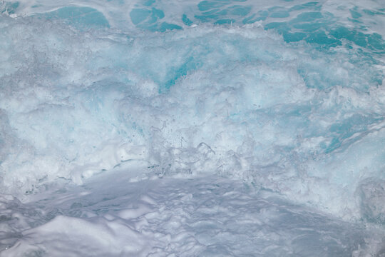 Ocean wave with sea foam and turquoise water texture