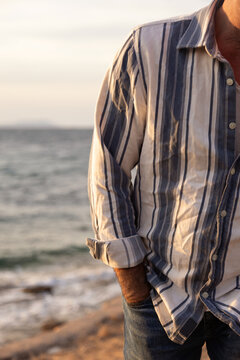 Casual beachside moment in striped shirt