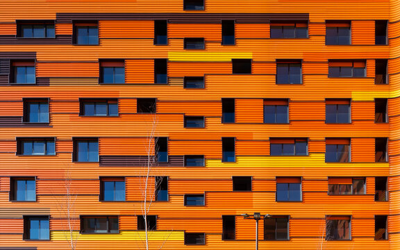 Modern urban apartment facade with vibrant colors