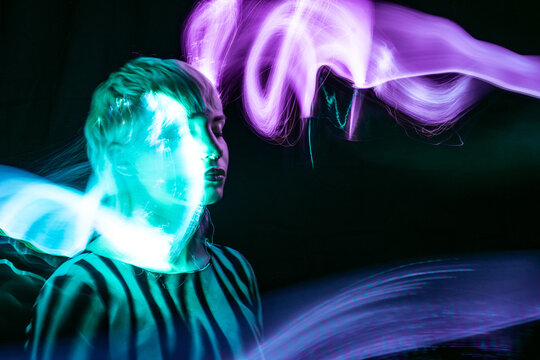 Young woman immersed in a vibrant metaverse experience
