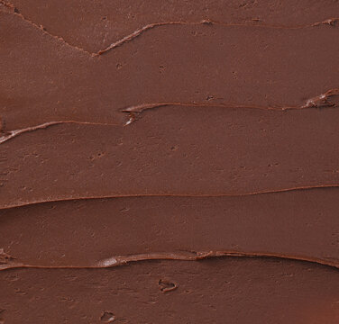 chocolate background texture, dark chocolate background,dark chocolate paste texture, choco spreadable cream close up, chocolate spread, cocoa filling, hazelnut butter, hazelnut paste, hot chocolate