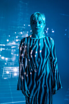 Young woman immersed in a futuristic metaverse world