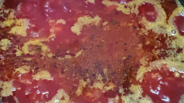 Boiling of red beetroot borscht in multi-cooker pot