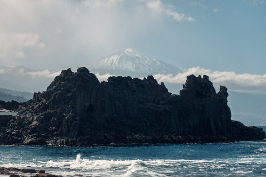 Volcanic seascape at El Pris with Teide, Tenerife