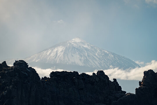 Teide volcano above clouds from El Pris, Tenerife coast
