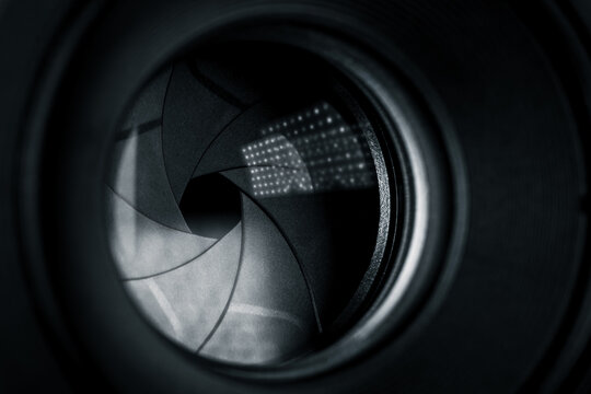 Aperture blades in a black camera lens in macro