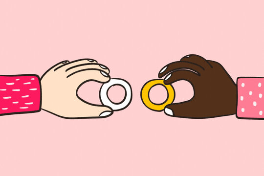 Hands exchanging rings symbolizing contract and finance