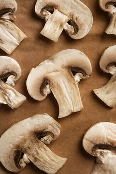 Fresh mushrooms pattern on brown paper flat lay background