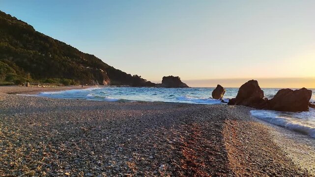The sunset at the beach Potami in Samos island, Greece