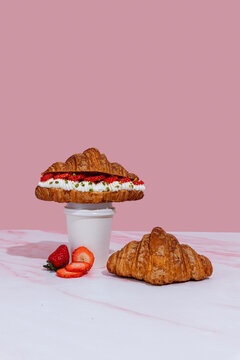 Croissant with strawberries and cream for fancy brunch