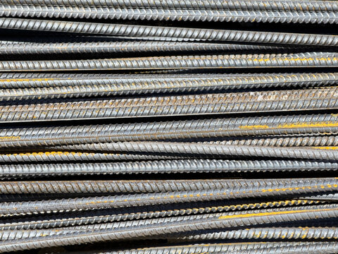Stacked steel rebar rods texture for construction industry