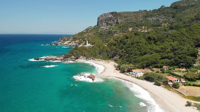 The beach Potami and the chapel Agios Nikolaos in Samos island, Greece