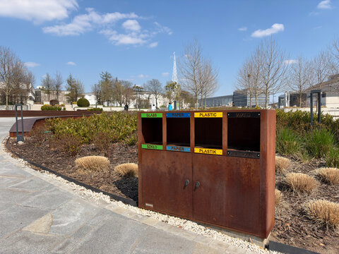 Community Metal Waste Collection. Neighborhood Recycling Station With Labels And Sky Background