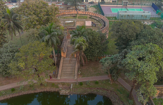 Aerial view of the Idrakpur Fort, an ancient Mughal fort, standing amidst the lush greenery, its weathered stones telling tales of history, Munshiganj, Dhaka Division, Bangladesh.