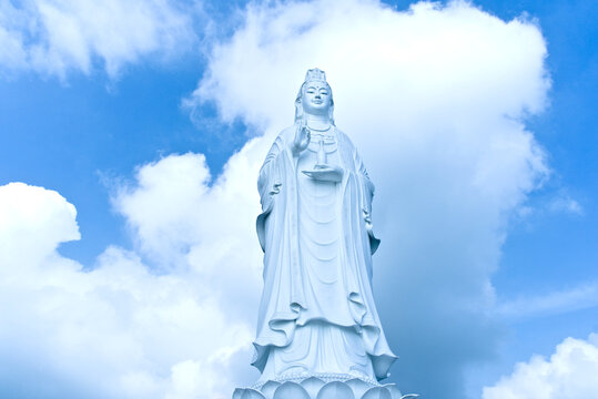 Full length view of the white Lady Buddha (Guanyin) statue on a lotus pedestal, Linh Ung Pagoda, Da Nang, Vietnam