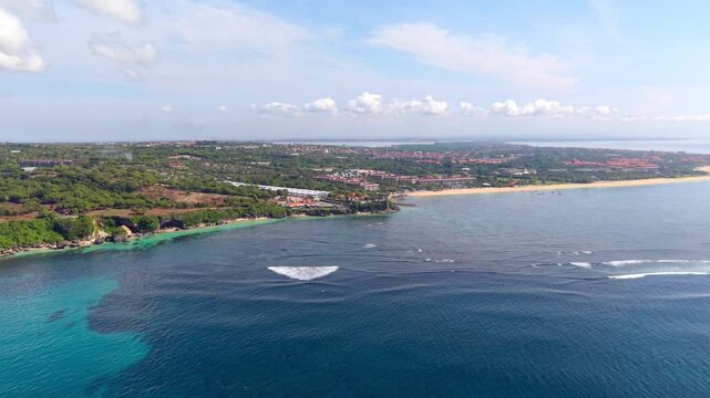 Panoramic Aerial Panorama of Geger Beach Nusa Dua Bali with Luxury Resorts and Coastline