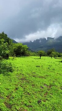 Alang, Madan, Kulang (AMK) range stands mighty in the Western Ghats, wrapped in lush green valleys, drifting clouds, and peak monsoon magic. A breathtaking 4K view of Sahyadri wilderness.