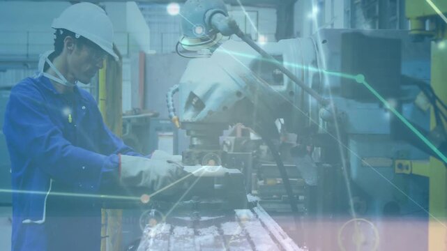Animated overlay receding and showing machinist placing and clamping cylinder workpiece for milling