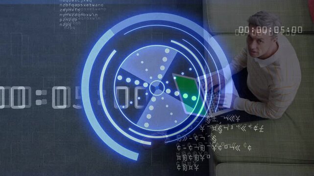 Man opening laptop and typing on couch, HUD rotating with timer advancing while debugging code