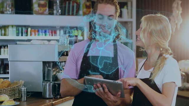 Two cafe staff tapping tablet and revealing 3D globe overlay, pointing and confirming menu detail
