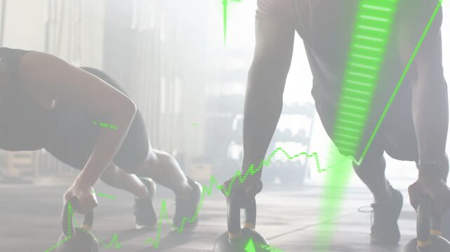 Training duo starting low, performing kettlebell pushups in fitness, green graphics tracking gains