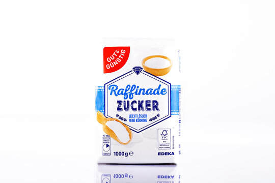 Gut & G&uuml;nstig Raffinade Zucker 1000g sugar package by Edeka photographed isolated on white background. German supermarket private label product shown as illustrative editorial food packaging