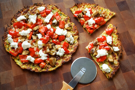 Vegetarian pizza with mushrooms peppers and cheese