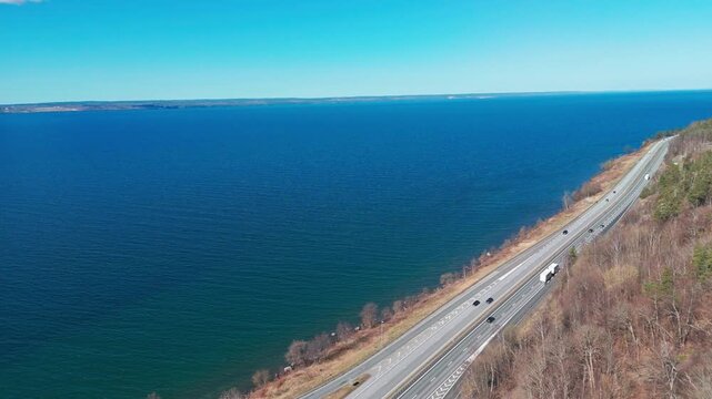 "Aerial view of E4 highway running along V&auml;ttern lake in J&ouml;nk&ouml;ping, Sweden"