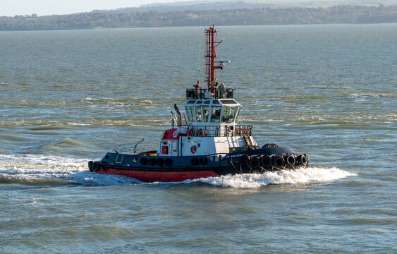 Portsmouth England UK. 07.04.2026.  Towage tug  VB Englishman on The Solent making way into Portsmouth Harbour UK. Background of the Isle of Wight,