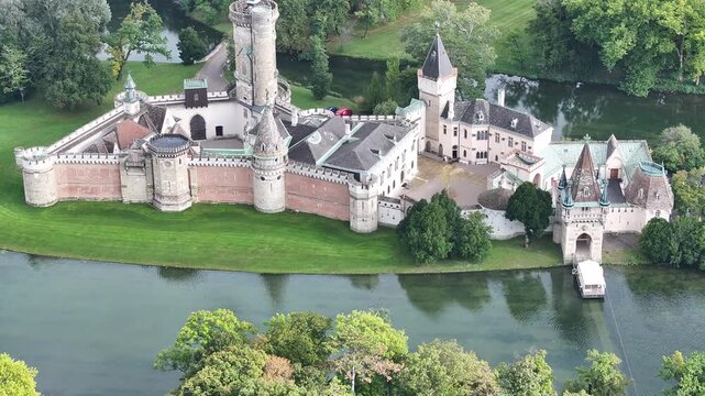 Aerial view of Franzensburg castle park and lake Austria.