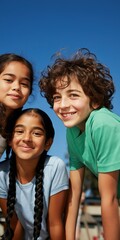 Fototapeta premium Children laughing and leaning forward outdoors under sky