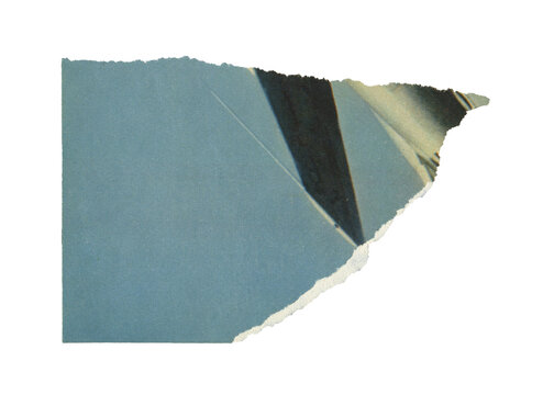 Vintage torn piece of aged newspaper texture. Old antique ripped sheet paper isolated.	