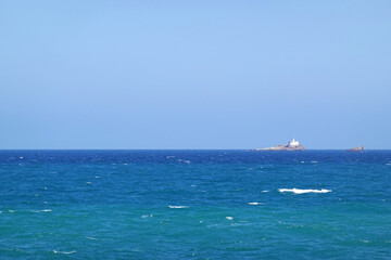 Fototapeta premium A lighthoise ah Horniga island, Cabo de Palos village, Spain