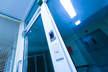 Fototapeta premium Security Camera Near Glass Entrance
