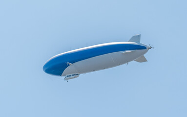 Zeppelin nt airship flying over lake constance during sunny day © Michael
