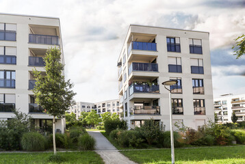 Cityscape of a residential area with modern sustainable apartment buildings, new green urban landscape in the city © ah_fotobox