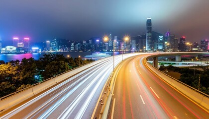 Fototapeta premium A city highway at night with light trails.