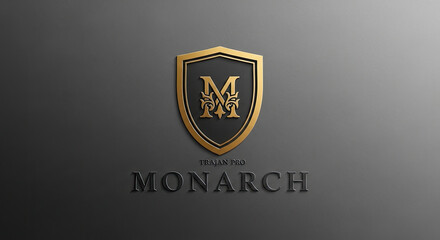 Fototapeta premium A metallic shield emblem with the letter 'M' and decorative elements, with text below.