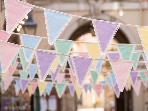 Pastel triangle pennant garland, romantic festive background for celebration