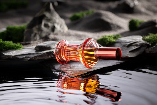 Aromatic red perfume on a lunar landscape with small pond.
