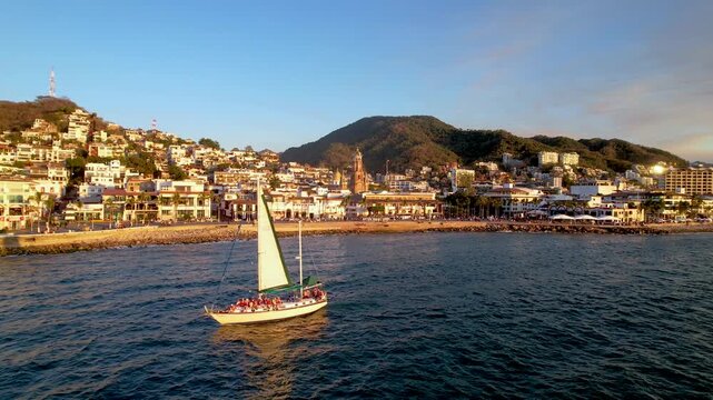 Boat at Puerto Vallarta Malec&oacute;n at sunset, Jalisco, Mexico
