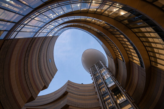 Osaka, Japan - June 26, 2025: Low angle view of Namba Parks, an office and shopping complex in the Naniwa Ward of Osaka, Japan.