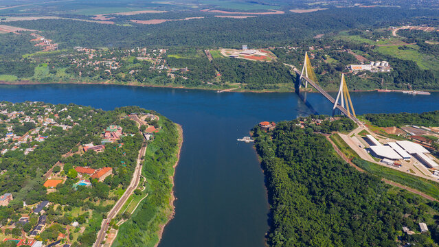 Iguazu and Parana rivers confluence at triple border with Integration Bridge.