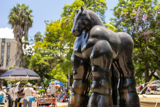 Medellin, colombia april 12, 2026, botero square fernando botero horse sculpture in urban square