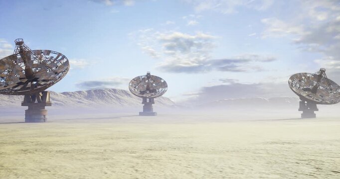 Mars simulation communication array in analog desert environment, engineered parabolic dishes mimic planetary base antennas across ochre plain with distant